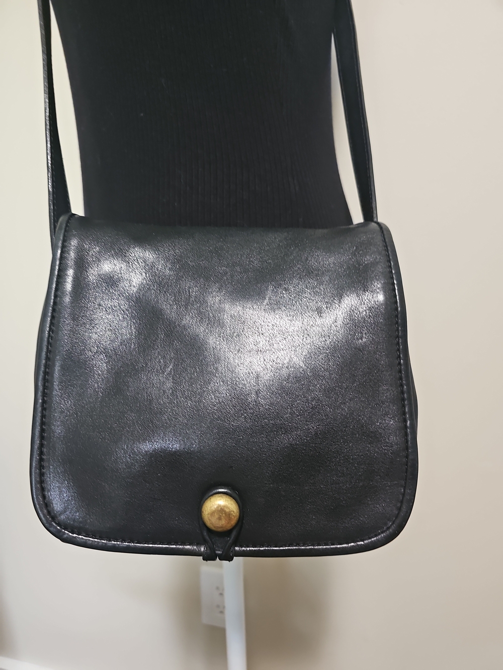 Classic Black Leather Crossbody Bag with Brass Button
